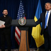 Ukranian President Volodymyr Zelensky and US President Donald Trump arrive at a press conference following talks at Trump's Mar-a-Lago residence in Palm Beach, Florida, on December 28, 2025. (Photo by Jim WATSON / AFP)
