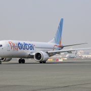 A Fly Dubai Boeing 737 Max taxis at Dubai International Airport in Dubai