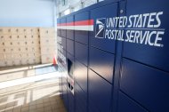 USPS Smart Lockers for package pickup stand in the lobby of the United States Postal Service (USPS)