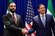 Marco Rubio (derecha), se reúne con el presidente sirio Ahmed al-Sharaa