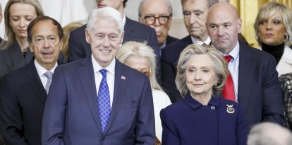 Former US President Bill Clinton and former US Secretary of State Hillary Clinton
