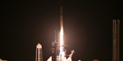 A SpaceX Falcon 9 rocket with the Crew Dragon Resilience capsule, carrying the crew of the Polaris Dawn Mission, lifts off from Launch Complex 39A at Kennedy Space Center in Cape Canaveral, Florida, on September 10, 2024. (Photo by CHANDAN KHANNA / AFP)