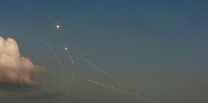 An Israeli aerial defense system launches missiles to intercept rockets fired from Lebanon