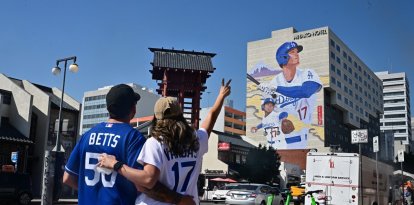 Fans de Los Dodgers antes del partido. (Photo by Frederic J. BROWN / AFP)