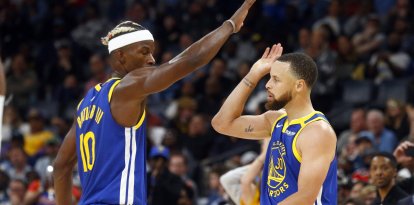 Jimmy Butler y Stephen Curry