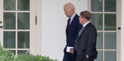 US President Joe Biden speaks with White House Physician Kevin O'Connor