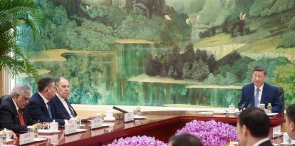 Xi Jinping junto al ministro de Asuntos Exteriores ruso, Serguéi Lavrov