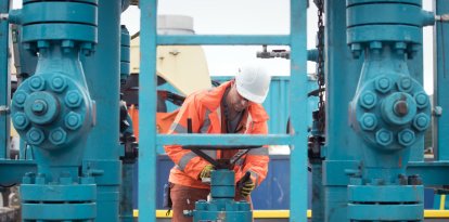 File photo dated 05/10/18 of a worker at the Cuadrilla fracking site in Preston New Road, Little Plumpton, Lancashire, as Labour has pledged to ban fracking "once and for all" as it hit out at suggestions that the Government could move to ban solar farms from much of England's farmland.