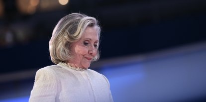 Former US Secretary of State Hillary Clinton steps off stage after speaking on the first day of the Democratic National Convention (DNC) at the United Center in Chicago, Illinois, on August 19, 2024. Vice President Kamala Harris will formally accept the partys nomination for president at the DNC which runs from August 19-22 in Chicago. (Photo by Brendan SMIALOWSKI / AFP)