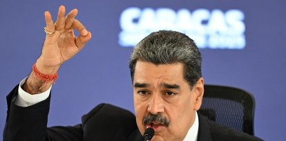Venezuela's President Nicolas Maduro speaks during a press conference in Caracas on September 1, 2025. Guyana's President Irfaan Ali, expressed on Monday his support for the deployment of US military forces in the Caribbean, while Caracas accused him of seeking to encourage a 'war front' due to allegations of a supposed attack from Venezuela against a Guyanese vessel. (Photo by Juan BARRETO / AFP)