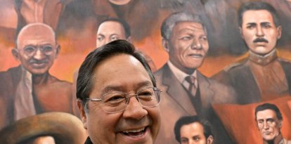 El presidente de Bolivia, Luis Arce Catacora, sonríe durante una entrevista con AFP en la Casa Grande del Pueblo en La Paz el 18 de junio de 2025