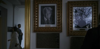 Portraits with new plaques of explanatory text are seen on the Presidential Walk of Fame on the Colonnade of the White House in Washington, DC, on December 17, 2025. (Photo by Brendan SMIALOWSKI / AFP)