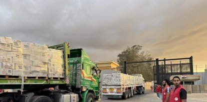Trucks carrying humanitarian aids as they enter Gaza