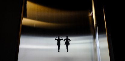 The logo of a man and a woman indicate the bathrooms (Files)