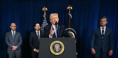 US President Donald Trump, alongside (L/R) Deputy Chief of Staff Stephen Miller, Secretary of State Marco Rubio, and US Secretary of Defense Pete Hegseth, speaks to the press following US military actions in Venezuela, at his Mar-a-Lago residence in Palm Beach, Florida, on January 3, 2026. President Trump said Saturday that US forces had captured Venezuelan leader Nicolas Maduro after launching a "large scale strike" on the South American country. (Photo by Jim WATSON / AFP)
