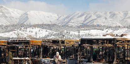 Buses that were burnt at a depot during recent public protests, in Tehran on January 21, 2026