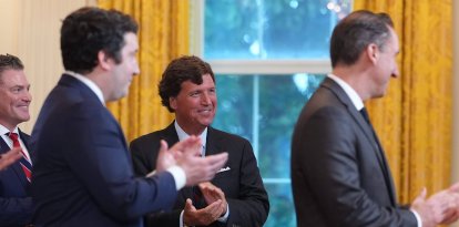 Tucker Carlson in the East Room of the White House