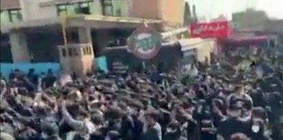 This video grab taken from UGC images posted on social media and verified by AFPTV teams in Paris on February 21, 2026, show Iranians demonstrating at the Amirkabir University of Technology in Tehran, chanting 'Long live the shah' and 'Death to the three corrupt' in Farsi. Iranian students chanted anti-government slogans at rallies for people killed during a recent wave of demonstrations, local and diaspora media reported February 21, 2026, as groups protesting the clerical leadership faced off with others voicing support for the government. (Photo by UGC / AFP) / - Israel OUT / - ISRAEL OUT / ISRAEL OUT - XGTY / RESTRICTED TO EDITORIAL USE - MANDATORY CREDIT AFP -  SOURCE: UGC ANONYMOUS - NO MARKETING - NO ADVERTISING CAMPAIGNS  - DISTRIBUTED AS A SERVICE TO CLIENTS - NO RESALE - NO ACCESS ISRAEL MEDIA/PERSIAN LANGUAGE TV STATIONS OUTSIDE IRAN/ STRICTLY NO ACCESS BBC PERSIAN/ VOA PERSIAN/ MANOTO-1 TV/ IRAN INTERNATIONAL/RADIO FARDA - AFP IS NOT RESPONSIBLE FOR ANY DIGITAL ALTERATIONS TO THE PICTURE'S EDITORIAL CONTENT /