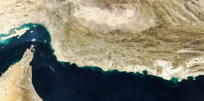 This handout natural-colour image acquired with MODIS on NASAs Terra satellite taken on February 5, 2025 shows the Gulf of Oman and the Makran region (C) in southern Iran and southwestern Pakistan, and the Strait of Hormuz (L) and the northern coast of Oman (bottom). Iran is considering relocating its capital from congested and smoggy Tehran to the coastal region along the Gulf, an ambitious plan to tackle the city's urban challenges and boost the country's sanctions-hit economy. Moving the capital has been a recurring discussion since the 1979 Islamic Revolution, but the proposals were repeatedly shelved due to financial and logistical hurdles. (Photo by NASA Earth Observatory / AFP) / RESTRICTED TO EDITORIAL USE - MANDATORY CREDIT "AFP PHOTO / NASA)" - NO MARKETING NO ADVERTISING CAMPAIGNS - DISTRIBUTED AS A SERVICE TO CLIENTS