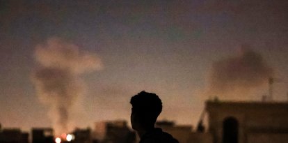 A plume of smoke rises after a strike on Tehran on March 4, 2026.