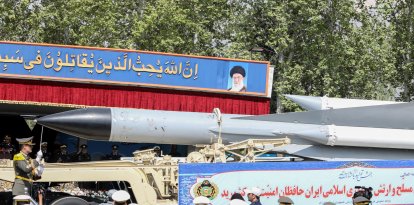 A truck carries a missile during a military parade as part of a ceremony marking the country's annual army day in Tehran (Files)