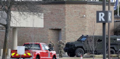 Law enforcement remain on site at the Temple Israel synagogue in Michigan