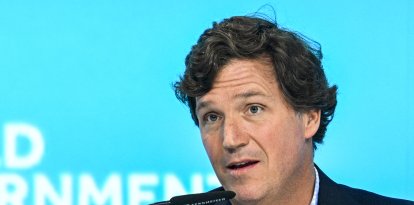 Tucker Carlson, US television personality and founder of the Tucker Carlson Network, speaks at a panel session during the World Government Summit in Dubai on February 12, 2024. (Photo by RYAN LIM / AFP)