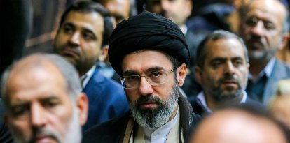 Mojtaba Khamenei (C), son of Iran's supreme leader Ayatollah Ali Khamenei