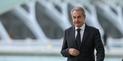 (FILES) Former Spanish Prime Minister Jose Luis Rodriguez Zapatero  arrives to attend a state memorial for the more than 230 victims of last year's floods on the one year anniversary of the disaster at the City of Arts and Sciences cultural and architectural complex in Valencia on October 29, 2025. Spain's former Socialist Prime Minister Jose Luis Rodriguez Zapatero has been placed under investigation for influence peddling and related crimes, a court said on May 19, 2026. (Photo by Oscar DEL POZO / AFP)