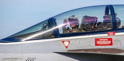 260511-N-IJ992-1292 - Electronic Attack Squadron (VAQ) 142, “Gray Wolves,” returned to Naval Station Whidbey Island, May 11, 2026, following a historic eleven-month deployment to U.S. 2nd, 4th, 5th and 6th Fleets as part of the Gerald R. Ford Carrier Strike Group assigned to Carrier Air Wing (CVW) 8. CVW-8 logged more than 5,500 flight hours in support of Operation Epic Fury alone, and more than 11,800 launches throughout the 11-month deployment. (U.S. Navy photo by Mass Communication Specialist 2nd Class Andy A. Anderson)