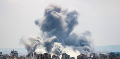 A plume of smoke rises following an Israeli airstrike on the outskirts of Tyre, southern Lebanon, on June 1, 2026. Iran's foreign ministry said on June 1 that a ceasefire in Lebanon remains a key condition for any deal with the United States to end the Middle East war. (Photo by KAWNAT HAJU / AFP)