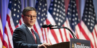 US Speaker of the House Mike Johnson speaks during a meeting with House Republicans and President-elect Donald Trump at the Hyatt Regency hotel in Washington, DC on November 13, 2024. (Photo by Allison ROBBERT / POOL / AFP)