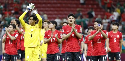 South Korea's players celebrate afterb beating the Czech Republic/ ULISES RUIZ