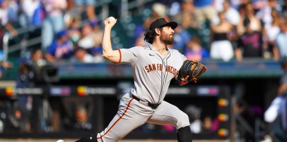 San Francisco Giants pitcher Ryan Walker (74) throws during the ninth inning of a baseball game against the New York Mets at Citi Field in Corona, N.Y., on August 3, 2025. (Photo by Gordon Donovan/NurPhoto) (Photo by Gordon Donovan / NurPhoto via AFP)