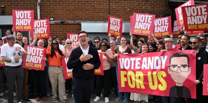 Labour party candidate Andy Burnham addresses supporters outside the Labour party campaign office in Ashton in Makerfield, northwest England, on June 18, 2026, as voters go to the polls to vote in the Makerfield by-election. Britain holds a unique vote on June 18 that could trigger the endgame for Labour leader Keir Starmer's beleaguered premiership, or win him a reprieve.