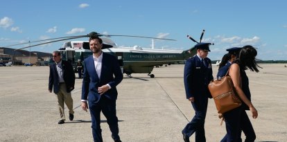 US Vice President JD Vance walks towards reporters after disembarking Marine Two at Joint Base Andrews, Maryland, on June 20, 2026. Vance will travel to Switzerland for talks with Iran, saying negotiations were going well. An Iranian negotiating team also left Iran for Switzerland on Saturday for discussions on the implementation of its agreement with the United States to halt the Mideast war, state media said. (Photo by Elizabeth Frantz / POOL / AFP)