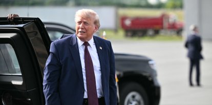 US President Donald Trump steps away from a vehicle as he makes his way to board Air Force One before departing from Reading Regional Airport (RDG) in Berks County, Pennsylvania on June 23, 2026. (Photo by Mandel NGAN / AFP)