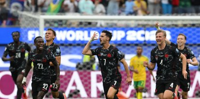 Los jugadores canadienses celebran la clasificación ante Sudáfrica/ Patrick T. Fallon
