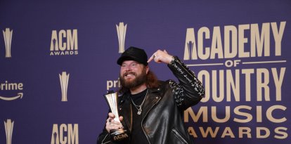 Nate Smith is posing with his prize in the press room during the 59th Academy of Country Music Awards Ceremony at The Ford Center at the Star in Frisco, United States, on May 16, 2024. (Photo by Javier Vicencio / Eyepix Group) (Photo by Eyepix/NurPhoto) (Photo by Eyepix / NurPhoto via AFP)