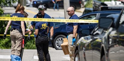 FBI investigators work the scene of an alleged ICE involved shooting in Biddeford, Maine.