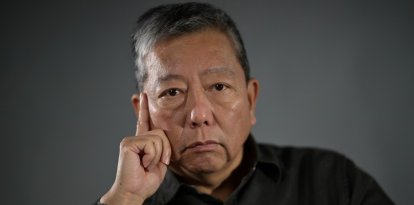 (FILES) Hong Kong pro-democracy activist Lee Cheuk-yan poses during a photo session in Hong Kong on March 21, 2021. Two activists who organised annual vigils marking China's deadly Tiananmen crackdown in 1989 were found guilty of "incitement to subversion", a Hong Kong court heard on August 21. (Photo by Peter PARKS / AFP)