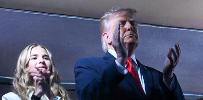 El presidente Donald Trump, junto a su nieta Kai Trump