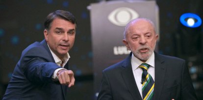 El presidente y candidato presidencial de Brasil, Luiz Inácio Lula da Silva, y el candidato presidencial de derecha, Flavio Bolsonaro