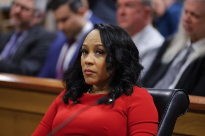 Fulton County District Attorney Fani Willis listens during the final arguments in her disqualification hearing at the Fulton County Courthouse on March 1, 2024, in Atlanta, Georgia. Fulton County Superior Judge Scott McAfee is considering a motion to disqualify Willis over her romantic relationship with Special Prosecutor Nathan Wade, whom she appointed as special prosecutor in the election interference charges against former president Donald Trump. (Photo by Alex Slitz / POOL / AFP)