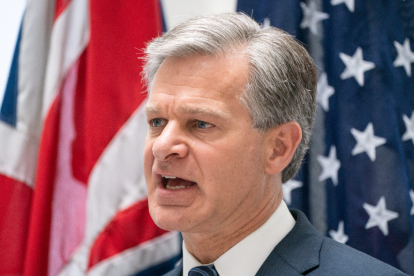 FBI Director Christopher Wray at a joint press conference in central London.