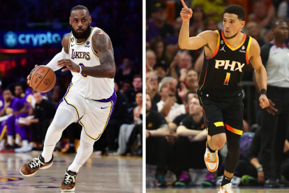 LeBron James, jugador de Los Ángeles Lakers, y Devin Booker, jugador de Phoenix Suns, durante el tercer partido de las semifinales de los Playoffs de la NBA 2023.