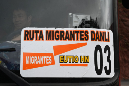 A Chinese migrant man is seen on board a bus that will take him to the border between Honduras and Guatemala and continue his route to the US, in Tegucigalpa on August 24, 2023. According to the National Institute of Migration, more than 222,000 migrants entered the country in the last eight months