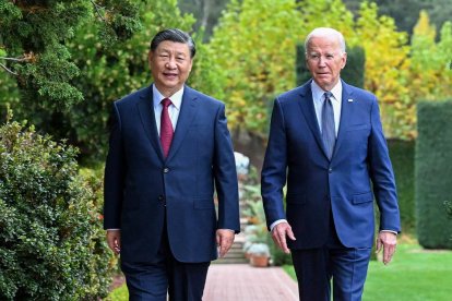 SAN FRANCISCO, Nov. 15, 2023 (Xinhua) -- Chinese President Xi Jinping and U.S. President Joe Biden take a walk after their talks in the Filoli Estate in the U.S. state of California, Nov. 15, 2023. Chinese President Xi Jinping and U.S. President Joe Biden on Wednesday had a candid and in-depth exchange of views on strategic and overarching issues critical to the direction of China-U.S. relations and on major issues affecting world peace and development. The meeting was held at Filoli Estate, a country house approximately 40 km south of San Francisco, California. (Xinhua/Li Xueren) (Photo by LI XUEREN / XINHUA / Xinhua via AFP)