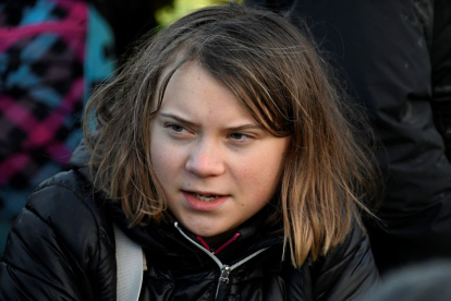 Greta Thunberg, Swedish climate activist, among a group of activists at the gates of the Garzweiler II open-pit lignite mine, January 17, 2023.