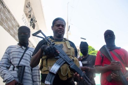 Armed gang leader Jimmy "Barbecue" Cherizier and his men in Port-au-Prince, Haiti, March 5, 2024. Haiti's police academy was attacked by an armed gang on March 5, as the small Caribbean nation plunged into further isolation following an airport raid and a deadly prison break.